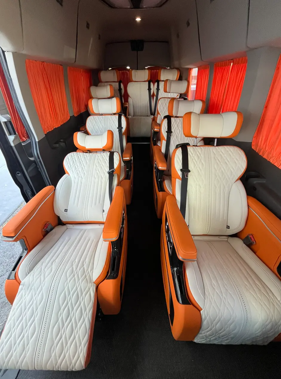 Cabin of the 10-seat van with high roof and wide aisle