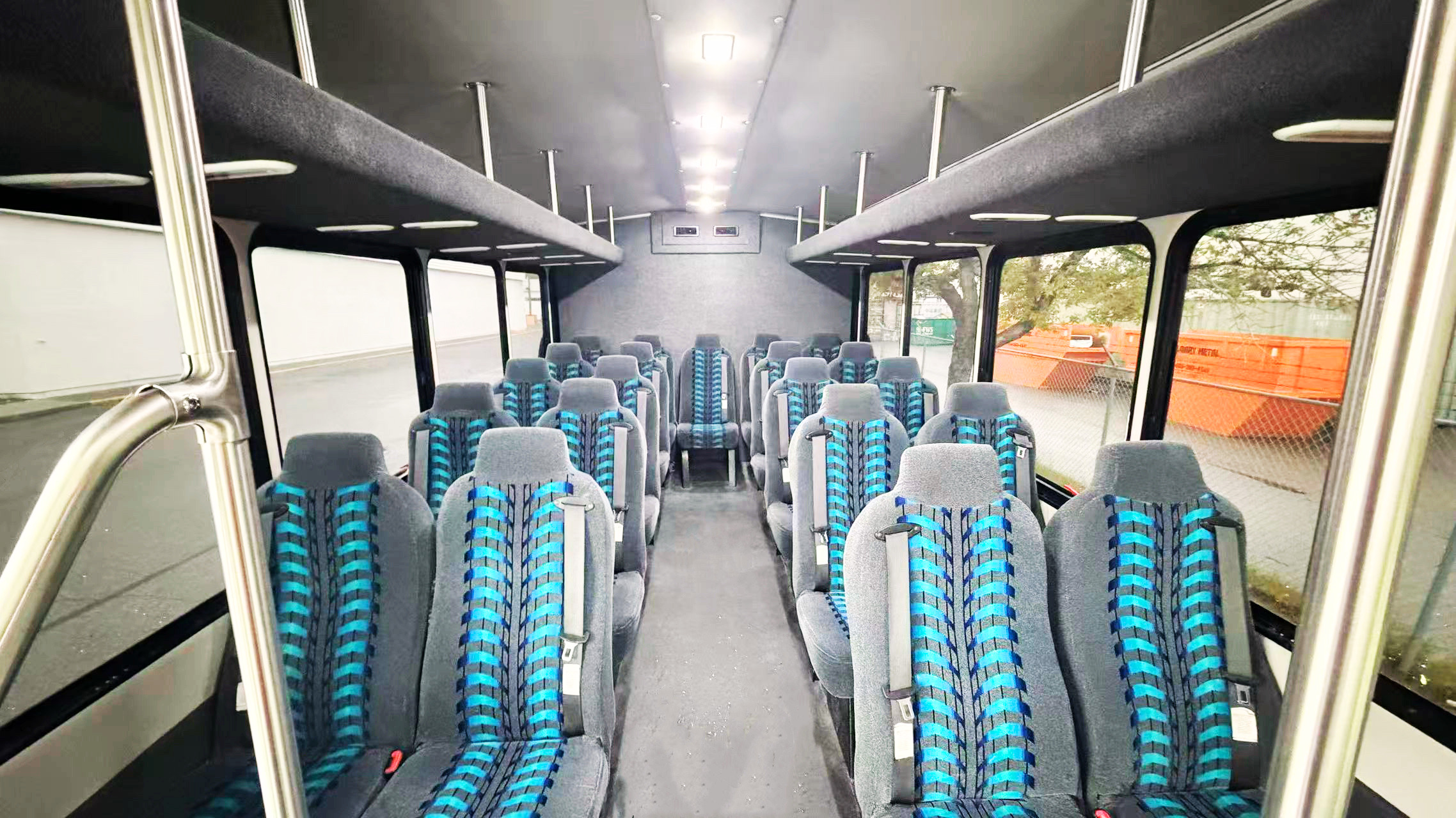 Spacious interior of the intimate 24-seat coach